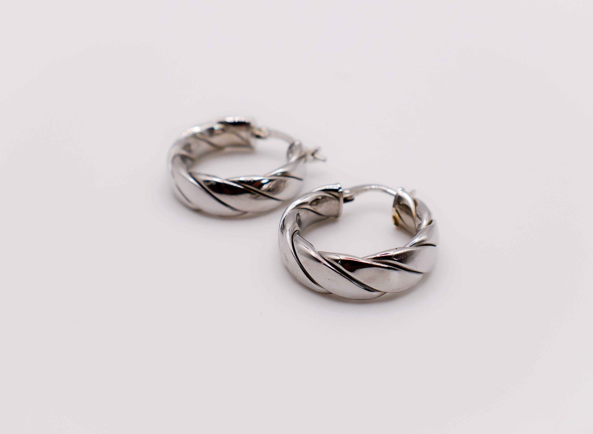 Italian Twirl Sterling Silver Hoop Earrings – Elegant Twisted Design